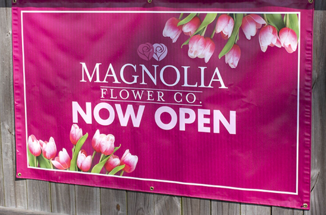Pink vinyl banner with tulip graphics